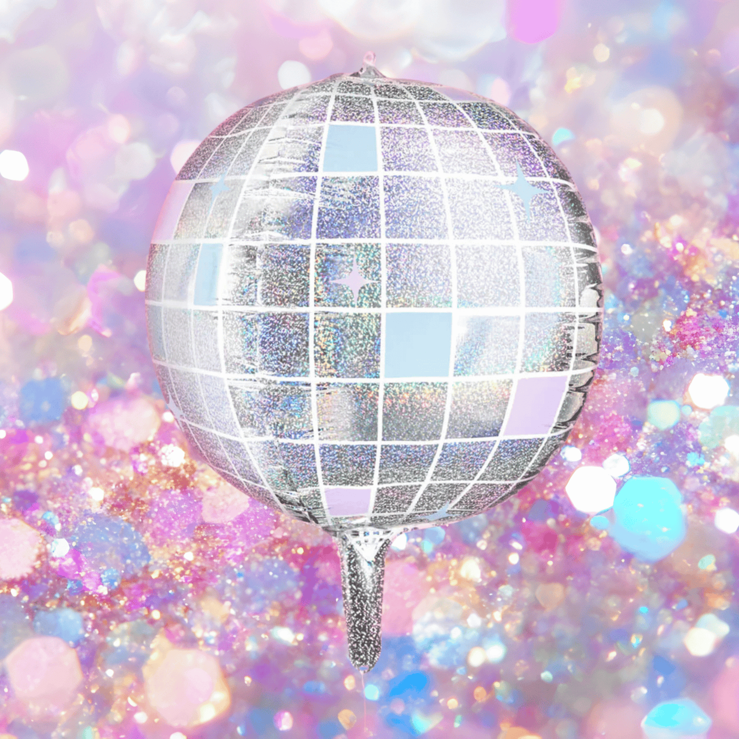 Silver disco ball against a colorful, glittery background