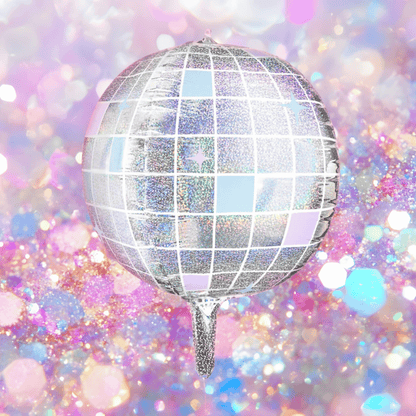 Silver disco ball against a colorful, glittery background