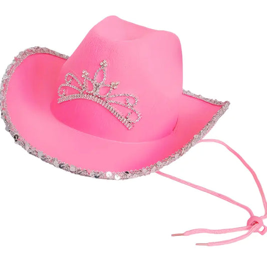 Pink cowboy hat with rhinestone tiara on a white background