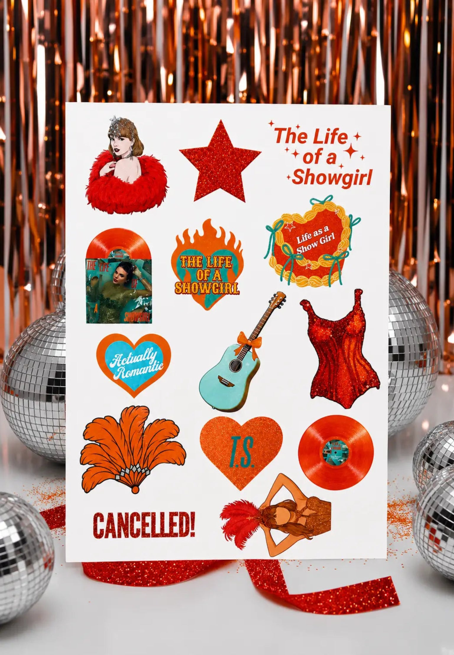 "Aesthetic 'The Life of a Showgirl' glossy sticker sheet styled with silver disco balls and rose gold tinsel for Swiftie party favors and sticker station decor Minty and Mallow Boutique Supplies."