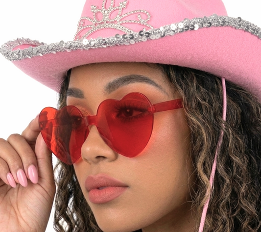 "Pink glitter cowboy hat with silver tiara accessory for disco cowgirl bachelorette party and eras tour outfits boutique supplies by Minty and Mallow"