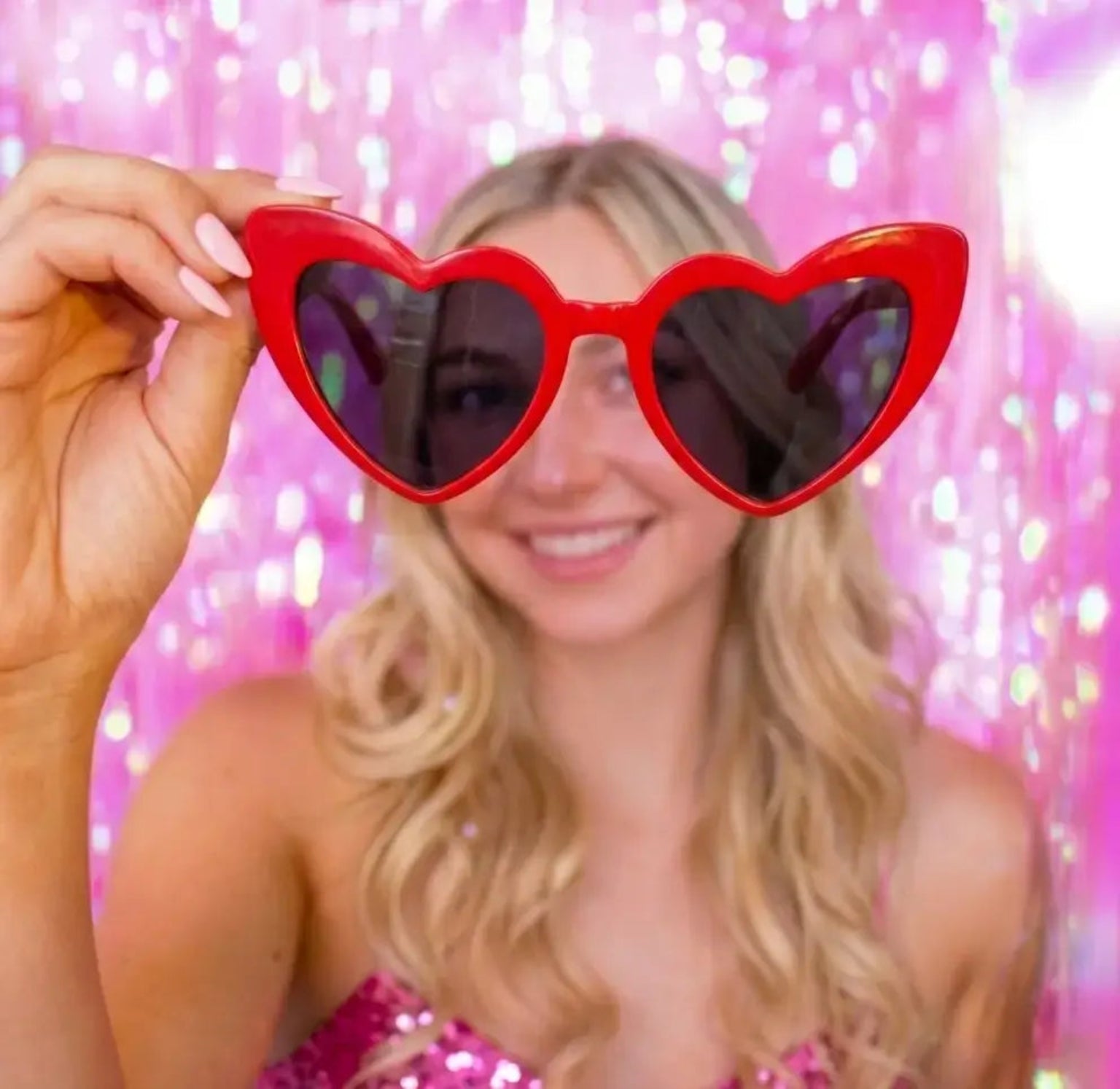 Red heartshaped sunglasses for parties 